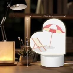 Love Acrylic Night Light, A Colorful Umbrella Is Open And Placed Over A Striped Lounge Chair. 7 Love Acrylic Night Light, A Colorful Umbrella Is Open And Placed Over A Striped Lounge Chair. -Cute Night Light Shop d11ed2b1e99add148bf7bdb20ea4b2f7903de6aa