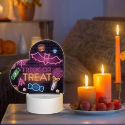 Love Acrylic Night Light, A Neon Sign That Says "trick Or Treat" On A Brick Wall. -Cute Night Light Shop d1cedec4891da974b69913b2a169051a4426ab79