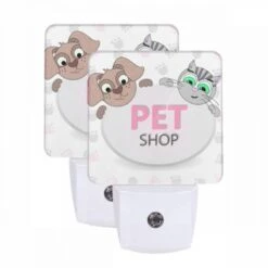 Night Light Set Of 2, A Pink Sign With A Cat And A Dog On It.