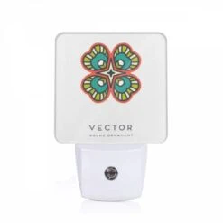 Night Light, A Round Ornament With A Green And Yellow Design.