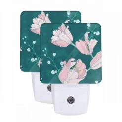 Night Light Set Of 2, A Pink Flower With A Yellow Center Is Blooming.