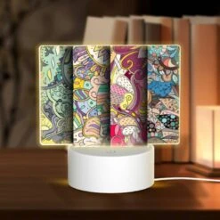 Rectangular Acrylic Night Light, Four Different Colored Designs Of A Flower.