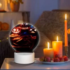 Round Acrylic Night Light, Three Pumpkins With Faces Carved Into Them Are Sitting On A Table. -Cute Night Light Shop dcc063a01f7681b6a2e119b51915be658846bc9f