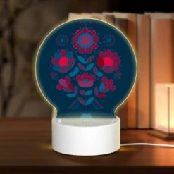 Round Acrylic Night Light, A Colorful Flower Arrangement In A Blue Vase.