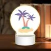 Round Acrylic Night Light, A Cartoon Drawing Of A Palm Tree On A Sandy Beach.