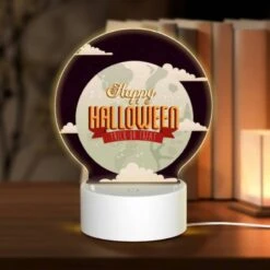 Round Acrylic Night Light, A Happy Halloween Sign With A Moon And A Trick Or Treat Message.