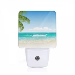 Night Light, A Beautiful Beach Scene With A Blue Ocean And Palm Trees.