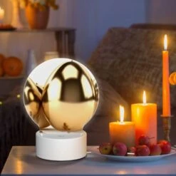 Round Acrylic Night Light, A Group Of Gold Eggs Are Sitting On A White Background. -Cute Night Light Shop eace73801a7d1a7e5e3f071f4c6fd00dba03145d