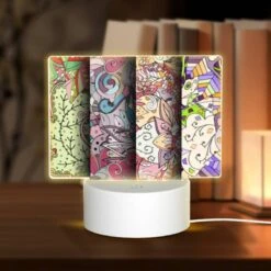 Rectangular Acrylic Night Light, Four Different Colored Paintings Of Flowers.