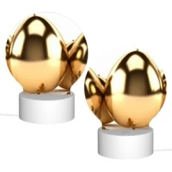 Round Acrylic Night Light, A Group Of Gold Eggs Are Sitting On A White Background. -Cute Night Light Shop f5757ca31f55f920d1a3e92e5fd6e33f2047589b