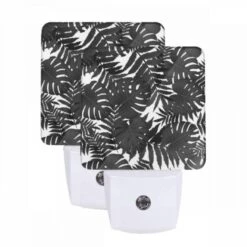 Night Light Set Of 2, A Pattern Of Leaves On A Black And White Background.