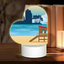 Front Page 17 Love Acrylic Night Light, A Beach Scene With A Lifeguard Tower And A Palm Tree.