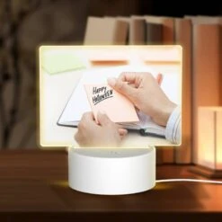 Rectangular Acrylic Night Light, A Person Is Writing A Note That Says "Happy Halloween" On A Piece Of Paper.